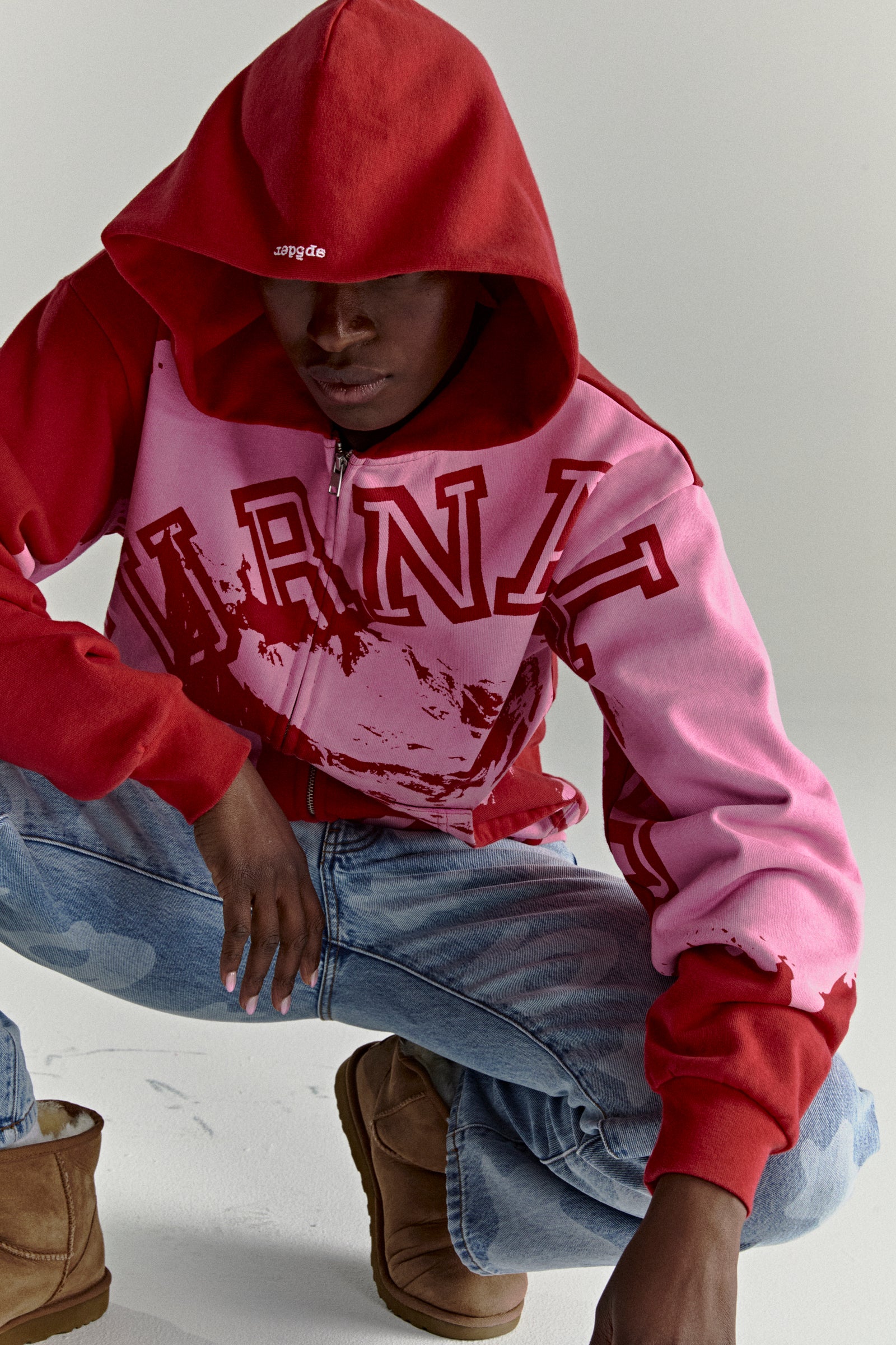 NOCTURNAL ZIP HOODIE: Red and pink color-blocked 13oz cotton fleece hoodie with varsity lettering and embroidered logo.