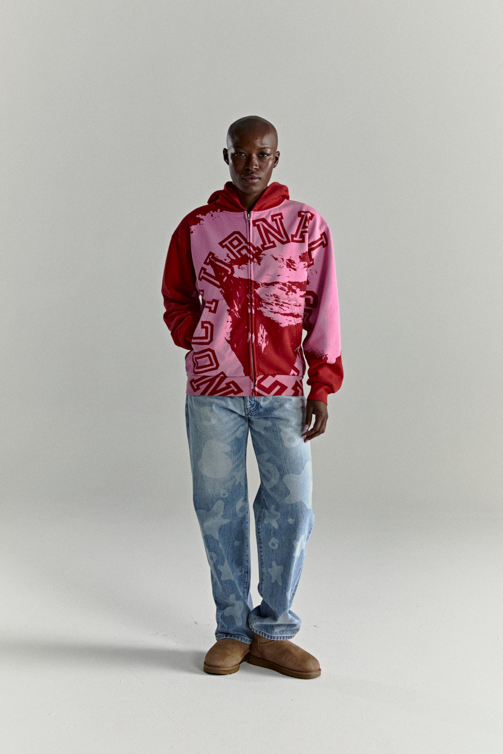 NOCTURNAL ZIP HOODIE: Color-blocked red and pink 13oz cotton fleece hoodie with varsity lettering.