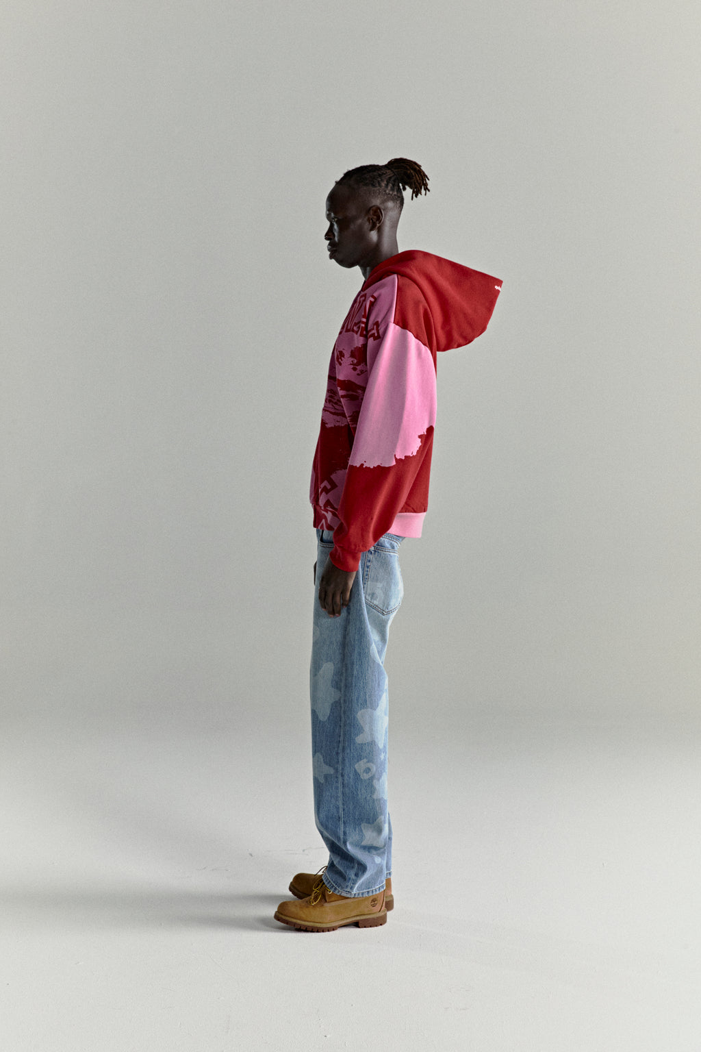 NOCTURNAL ZIP HOODIE: Red and pink color-blocked 13oz cotton fleece hoodie with varsity lettering.
