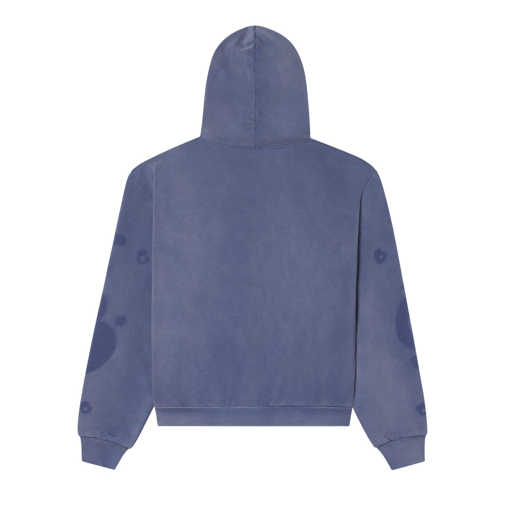 Back view of a blue 13oz cotton fleece hoodie with subtle star graphic prints on the sleeves and a rib knit hem.