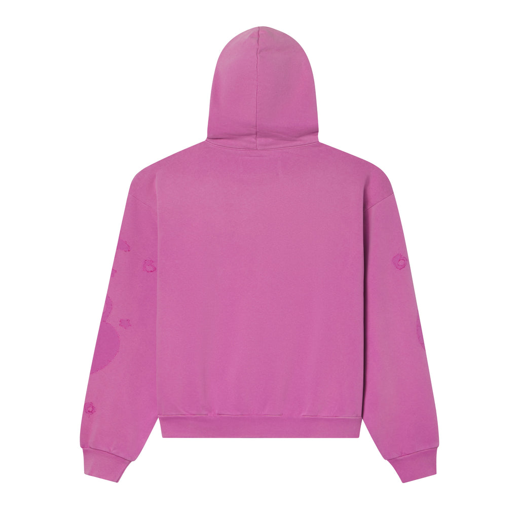 Back view of a pink 13oz cotton fleece hoodie with subtle distressed star graphic prints on the sleeves and ribbed trim.