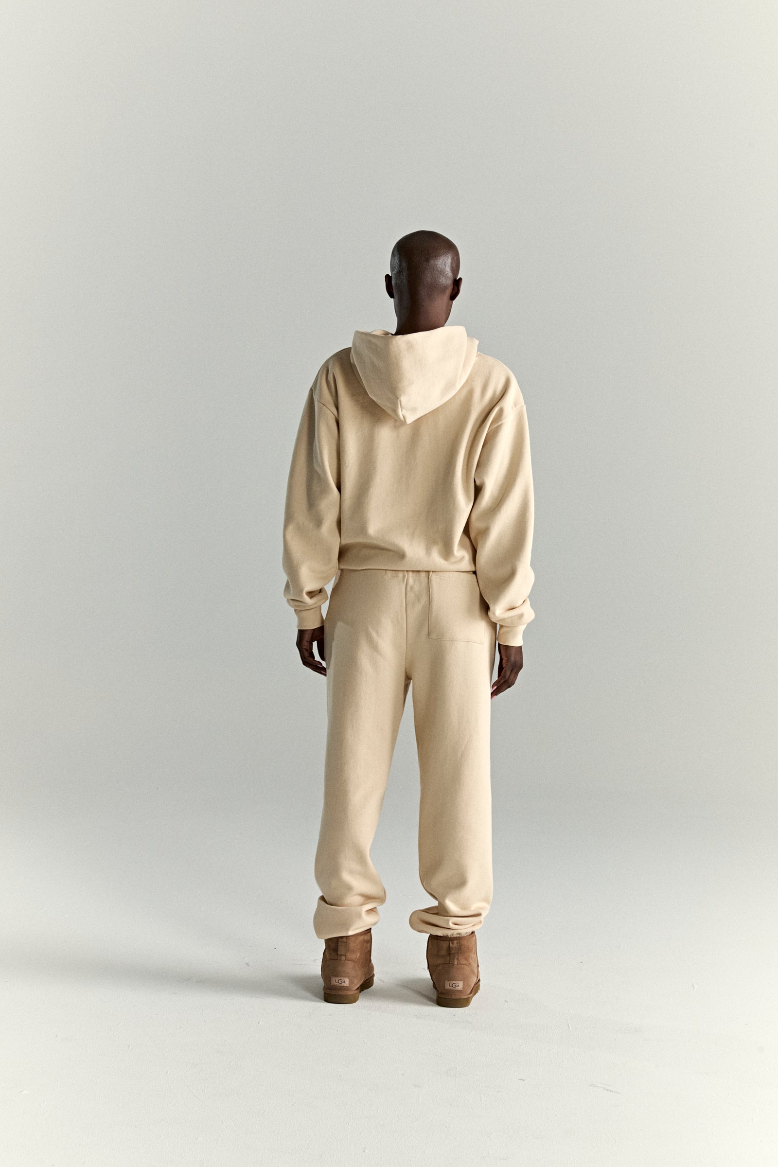 CREAM OG WEB V2 HOODIE ON MODEL
