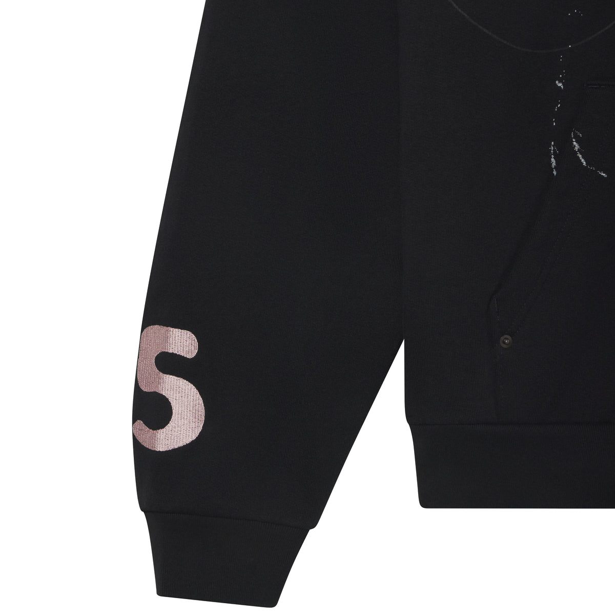 Black cotton fleece zip hoodie featuring a pink embroidered letter on the sleeve and distressed graphic prints.
