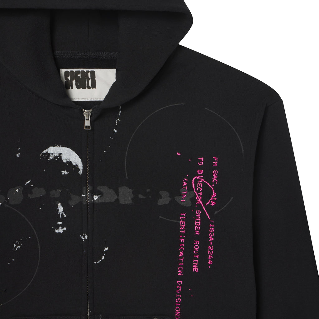 Black cotton fleece zip hoodie featuring distressed white and pink embroidered graphic designs on the chest.