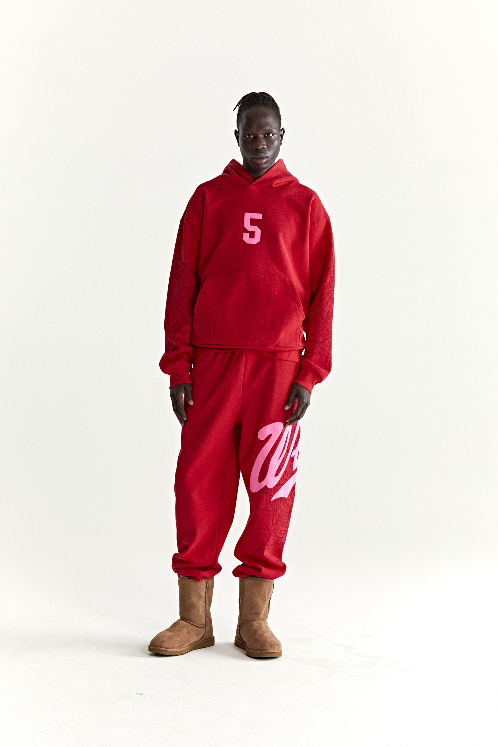 Red 13oz cotton fleece hoodie with pink '5' graphic, web detail sleeves, and matching sweatpants.