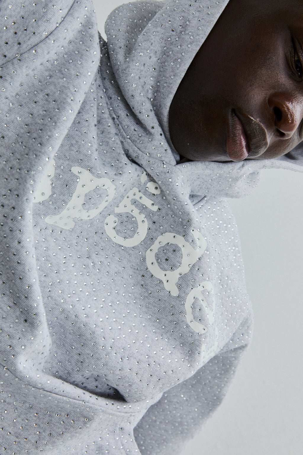 Gray VVS Hoodie with all-over tonal rhinestones and white SP5DER text print across the chest.