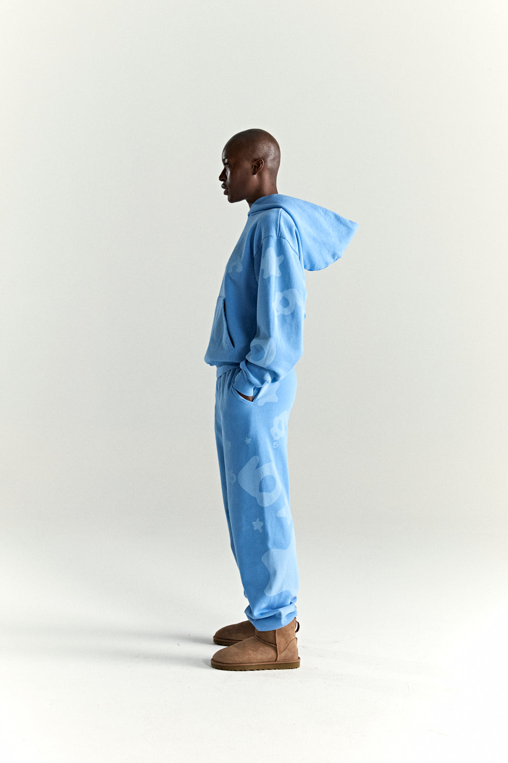 Beluga V2 Hoodie and sweatpants in light blue 100% cotton fleece with 'SP5DER' and star print.