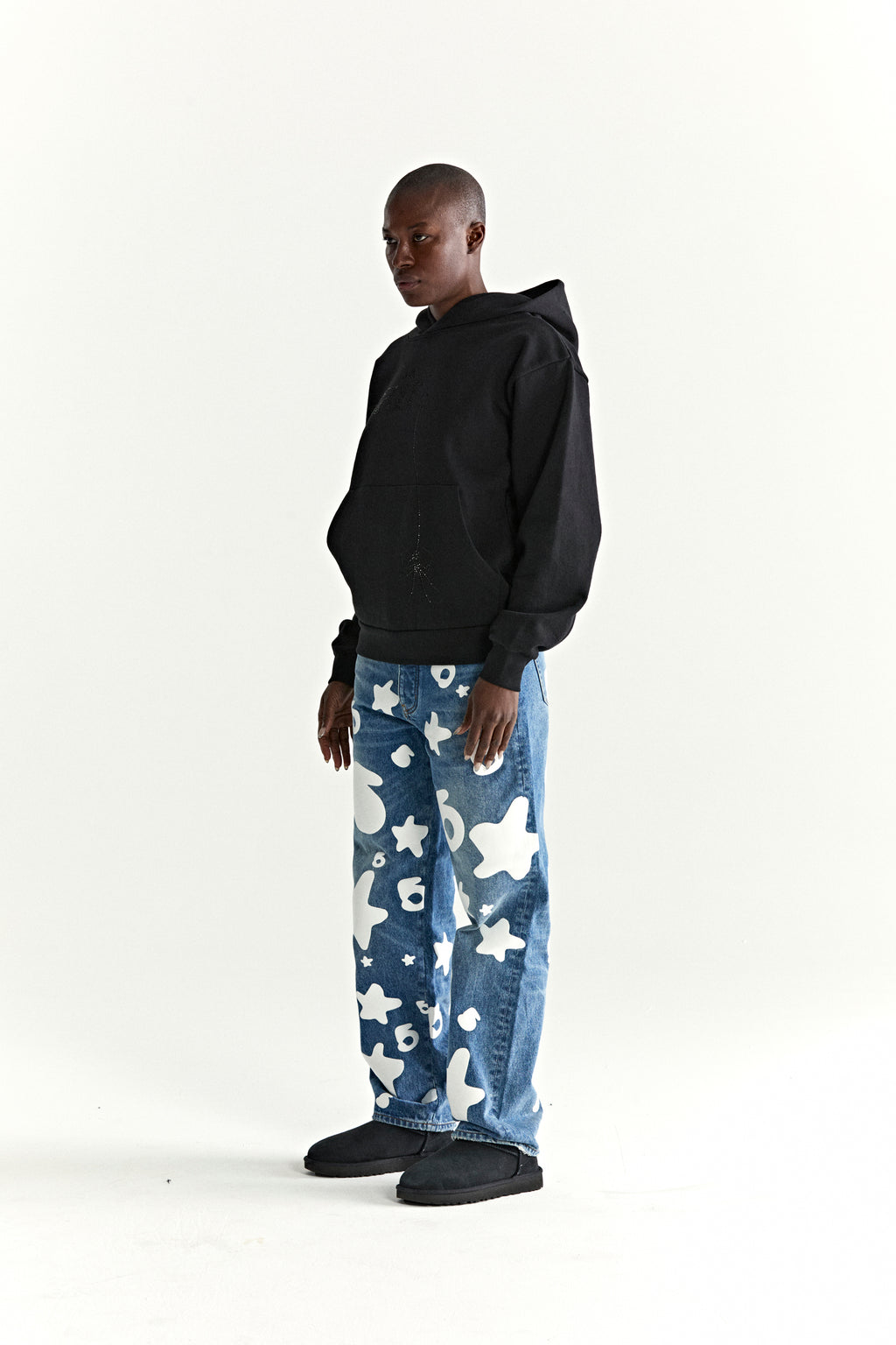 Black 13oz cotton fleece WAIT STONE HOODIE with rhinestone "Wait" detail, kangaroo pocket, rib knit hem and cuffs.