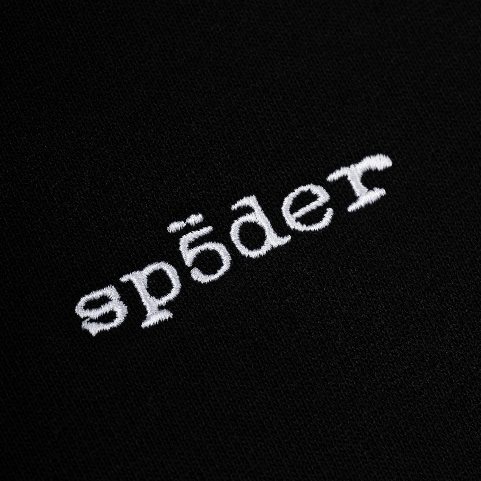 Black CORE CREWNECK with white embroidered 'SP5DER' logo on chest, made from brushed fleece.