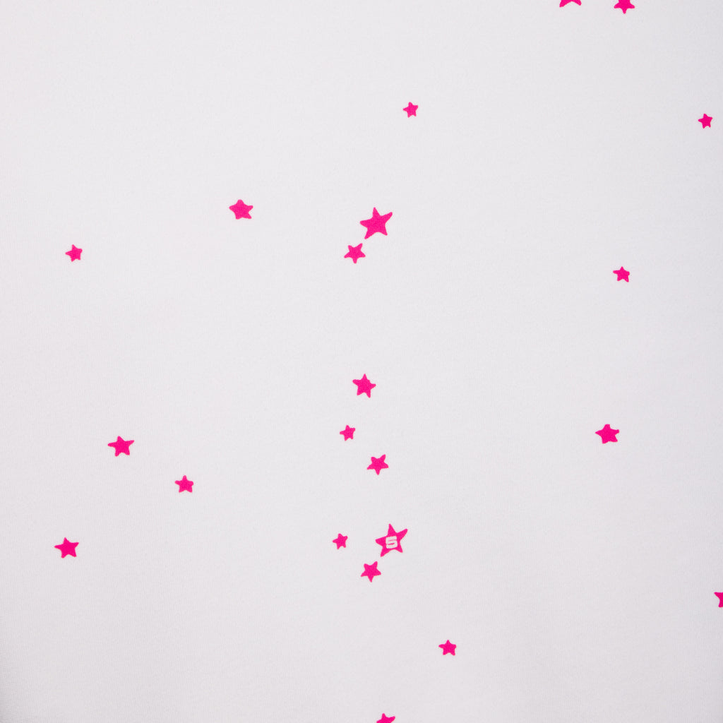 White french terry hoodie with scattered hot pink star print.