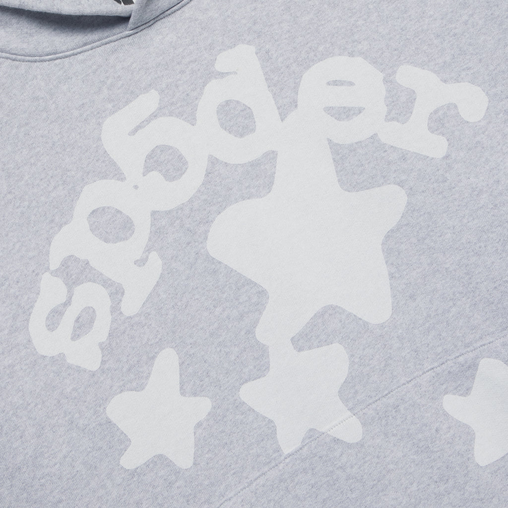 Close-up of a light grey BELUGA V2 HOODIE with white puff print beluga and stars design.