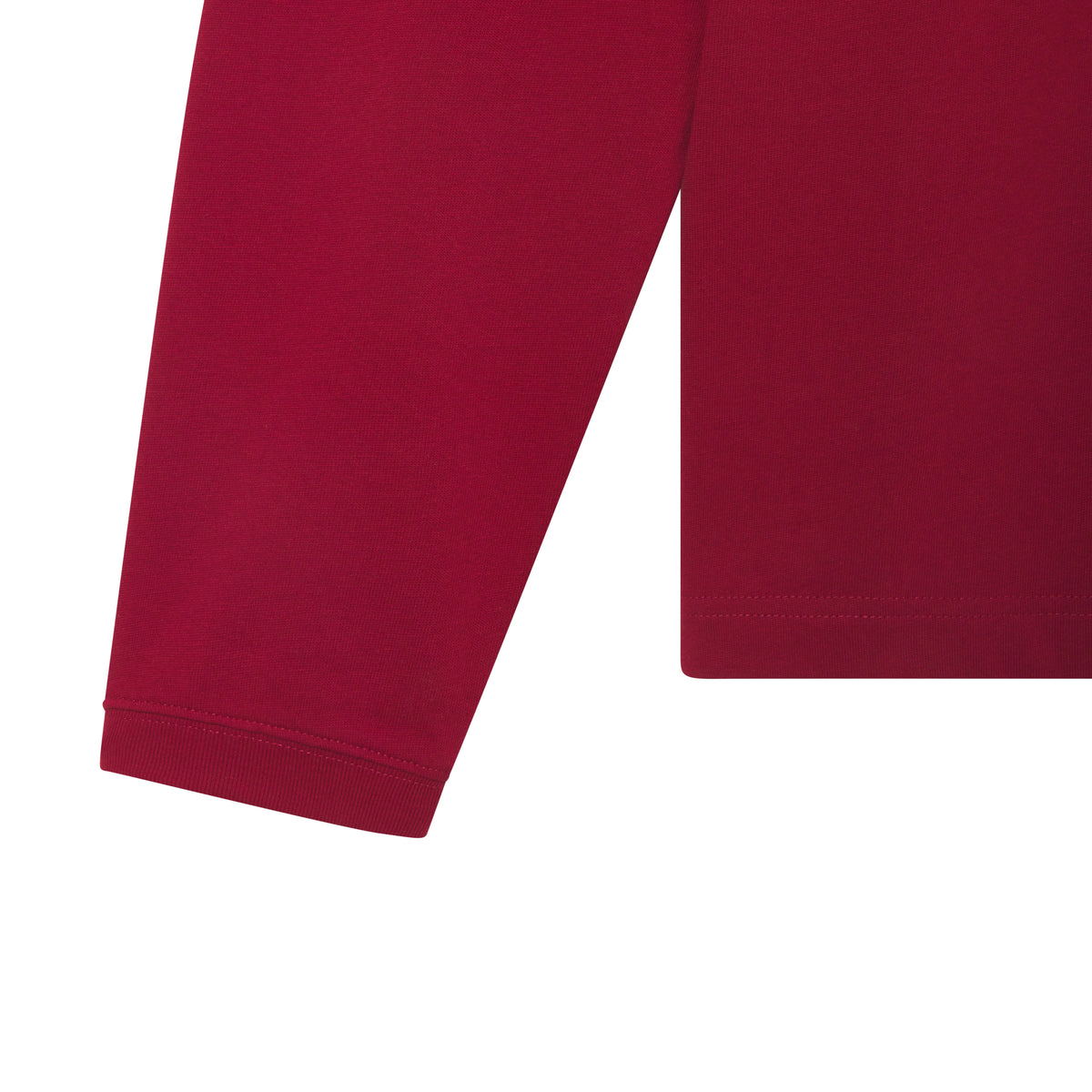 Close-up of a standard fit, deep red 100% cotton long sleeve tee with ribbed cuffs and hem.