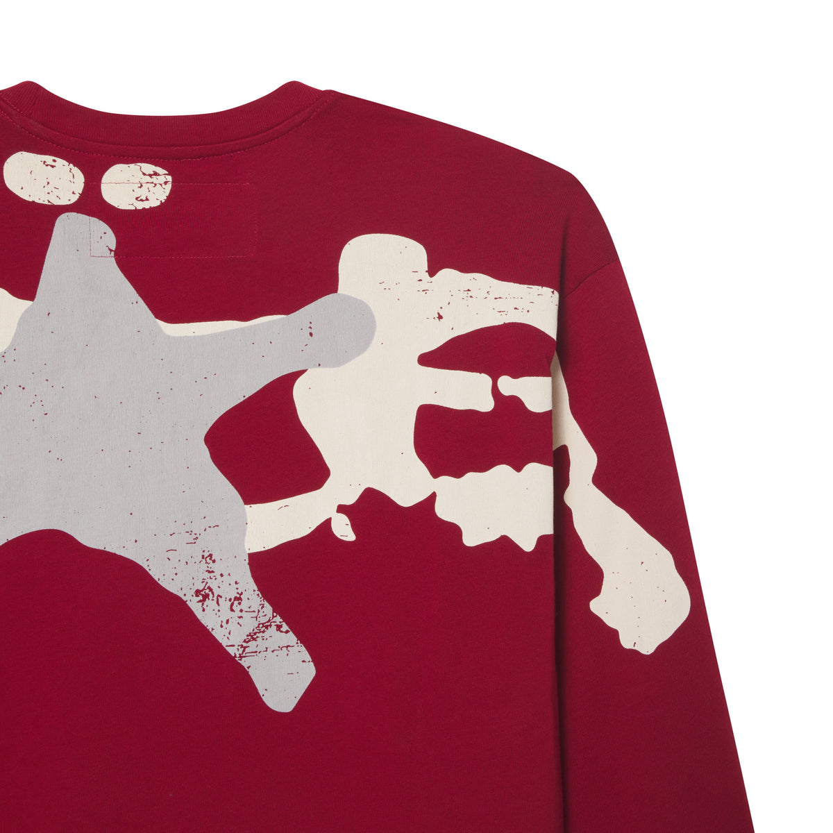 Maroon 100% cotton long sleeve tee featuring a distressed white and grey star graphic print across the back and shoulder.