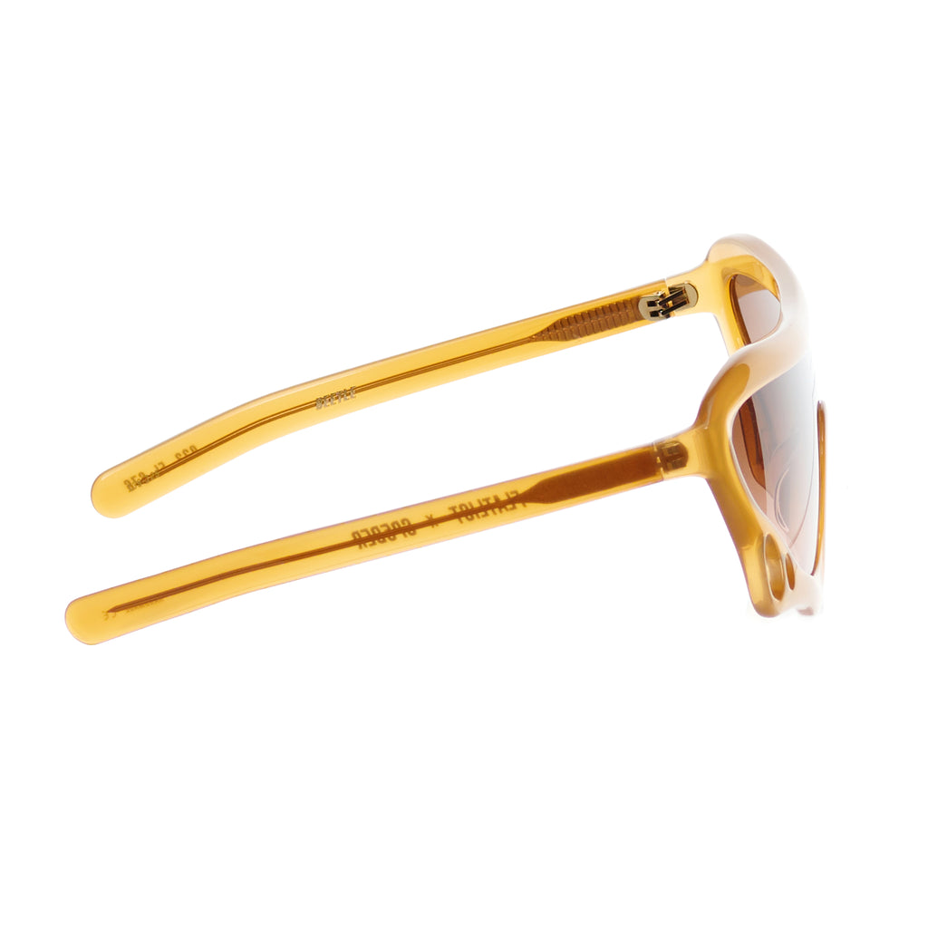 SP5 x FLATLIST 'BEETLE' sunglasses with translucent amber Mazzucchelli acetate frames and brown gradient lenses.