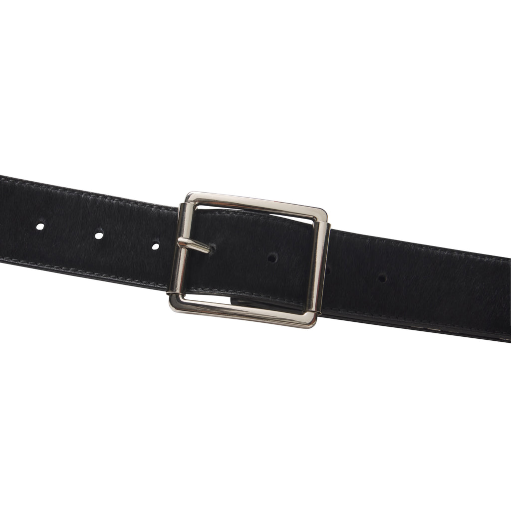 Black pony hair belt featuring a polished silver-tone rectangular buckle and tonal stitching on a white background.