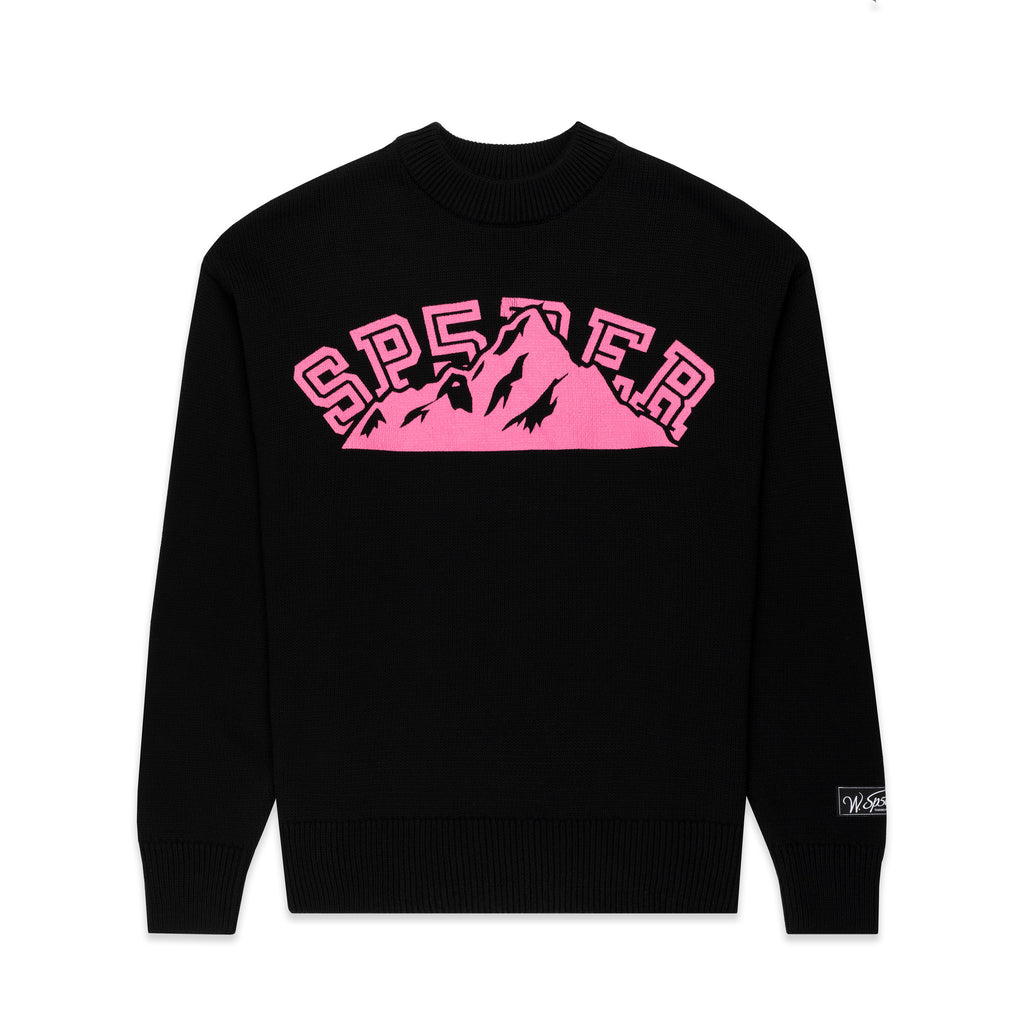 Black knitted sweater with pink "SP5DER" mountain graphic and sleeve patch.