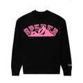 Black knitted sweater with pink "SP5DER" mountain graphic and sleeve patch.