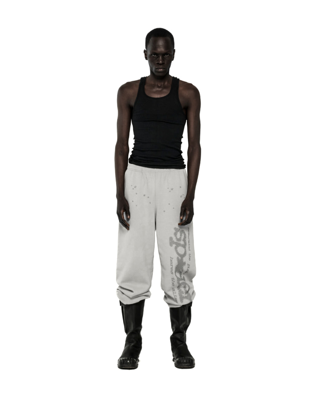 Light gray cotton fleece sweatpants with "P*NK SP5DER" text and star print, worn by a model.