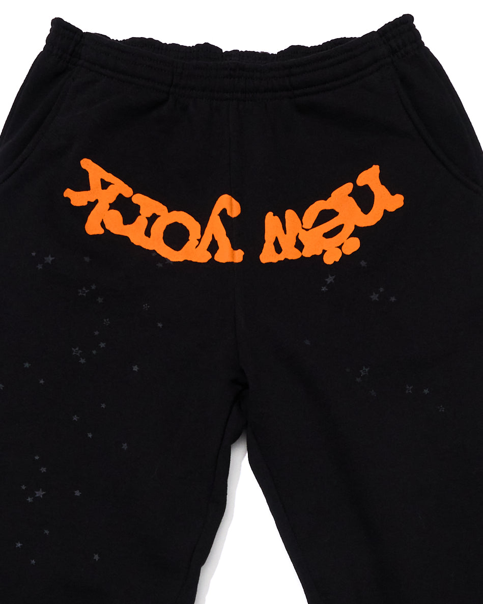 Black OG WEB V2 ALTERNATE SWEATPANT with orange "NEW YORK" puff print and subtle star discharge print.