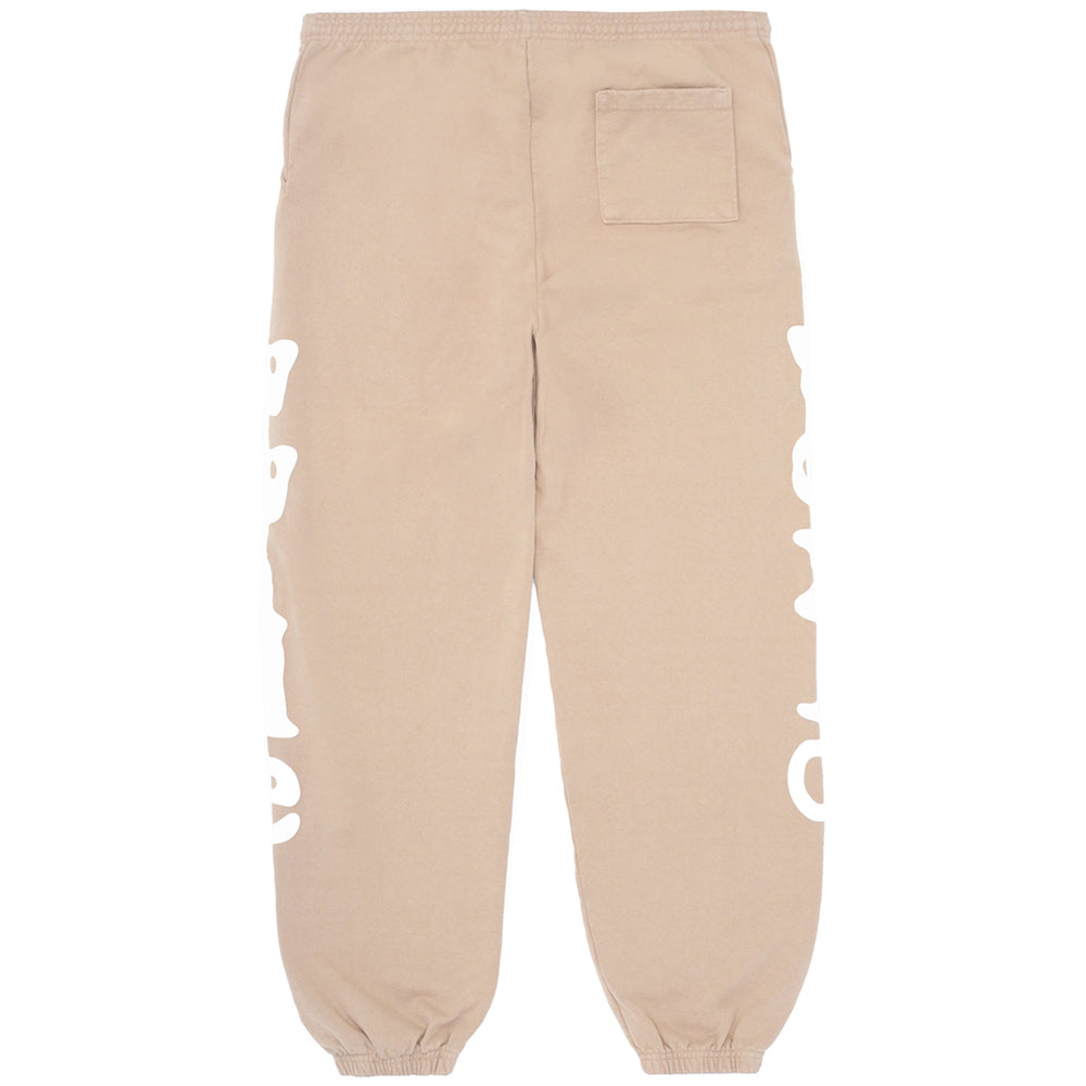 Sand Beluga sweatpants with white "Worldwide" text down both legs, made from 23oz fleece.