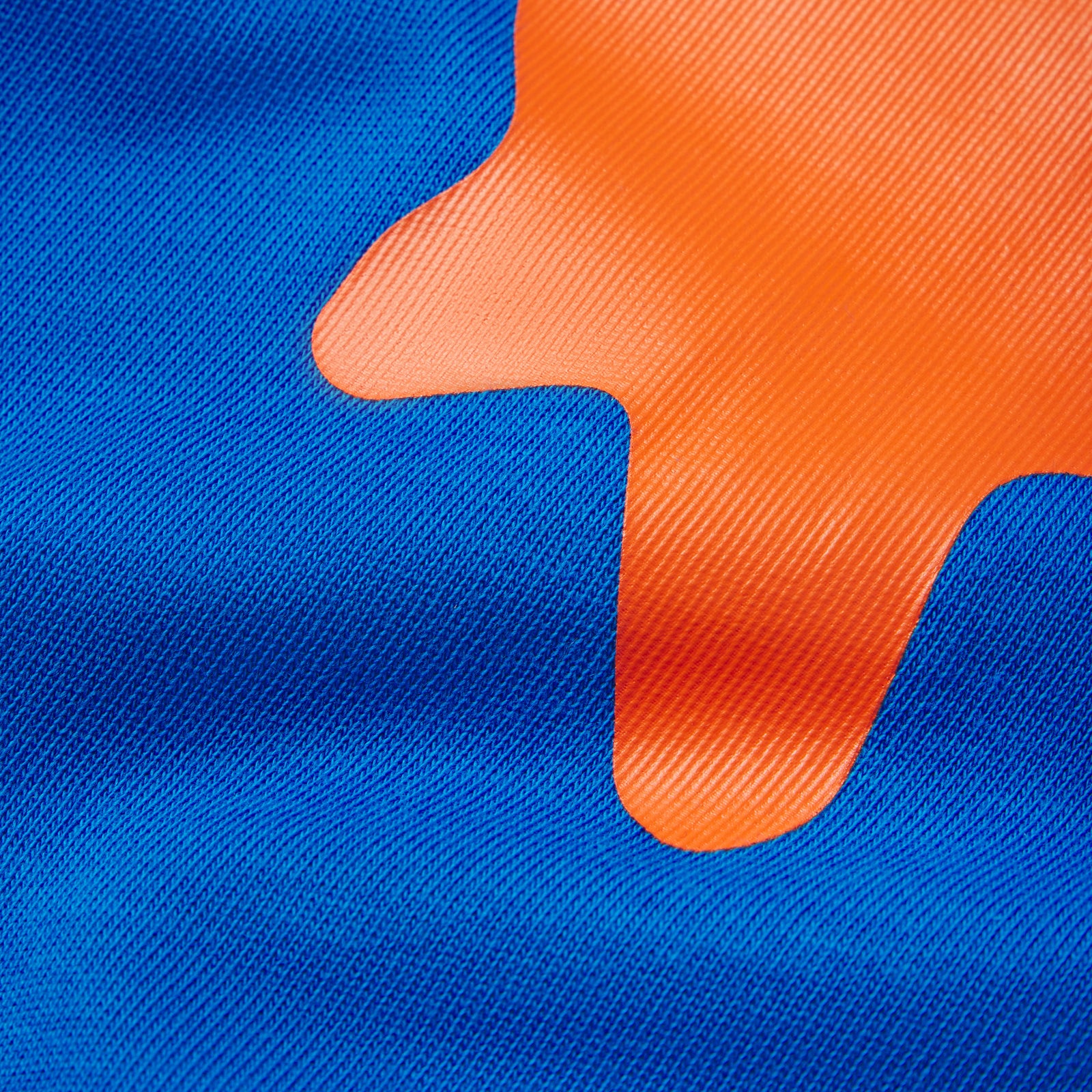 Blue 100% cotton tee featuring a vibrant orange plastisol graphic print with a smooth, textured finish.