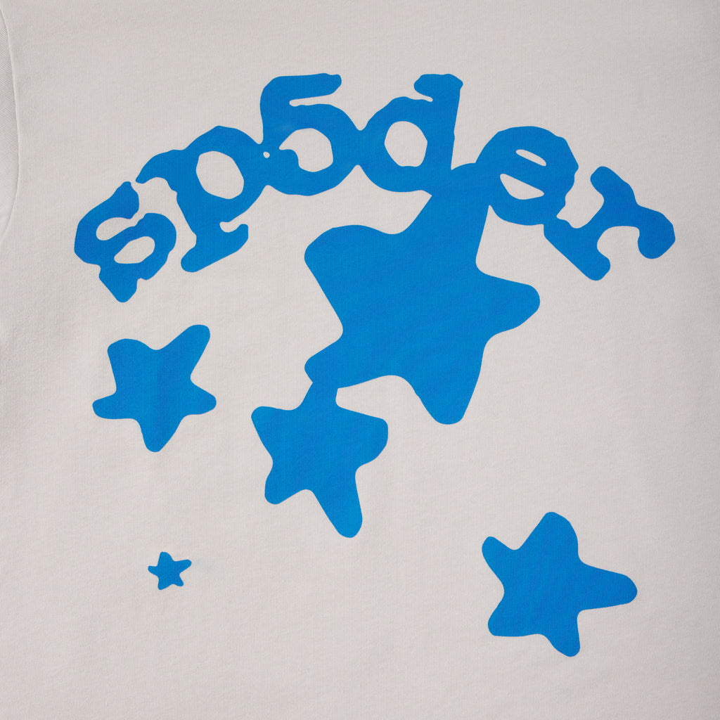 White 100% cotton tee featuring a bright blue plastisol graphic print of stars and stylized text on the front.