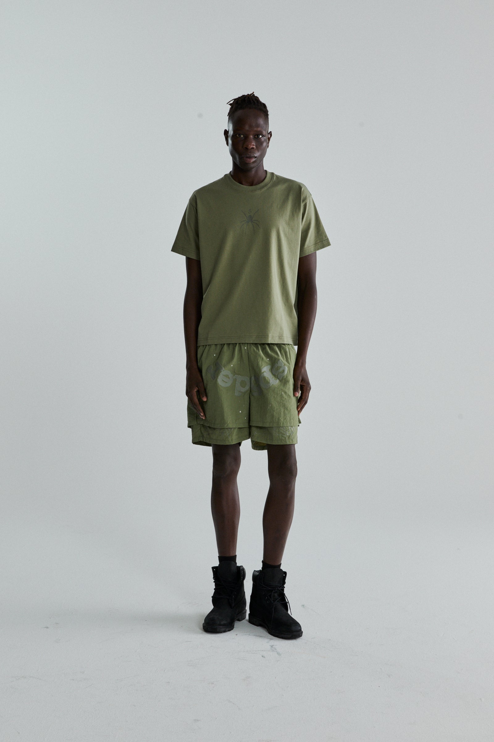 SAGE GREEN TM TEE ON MODEL