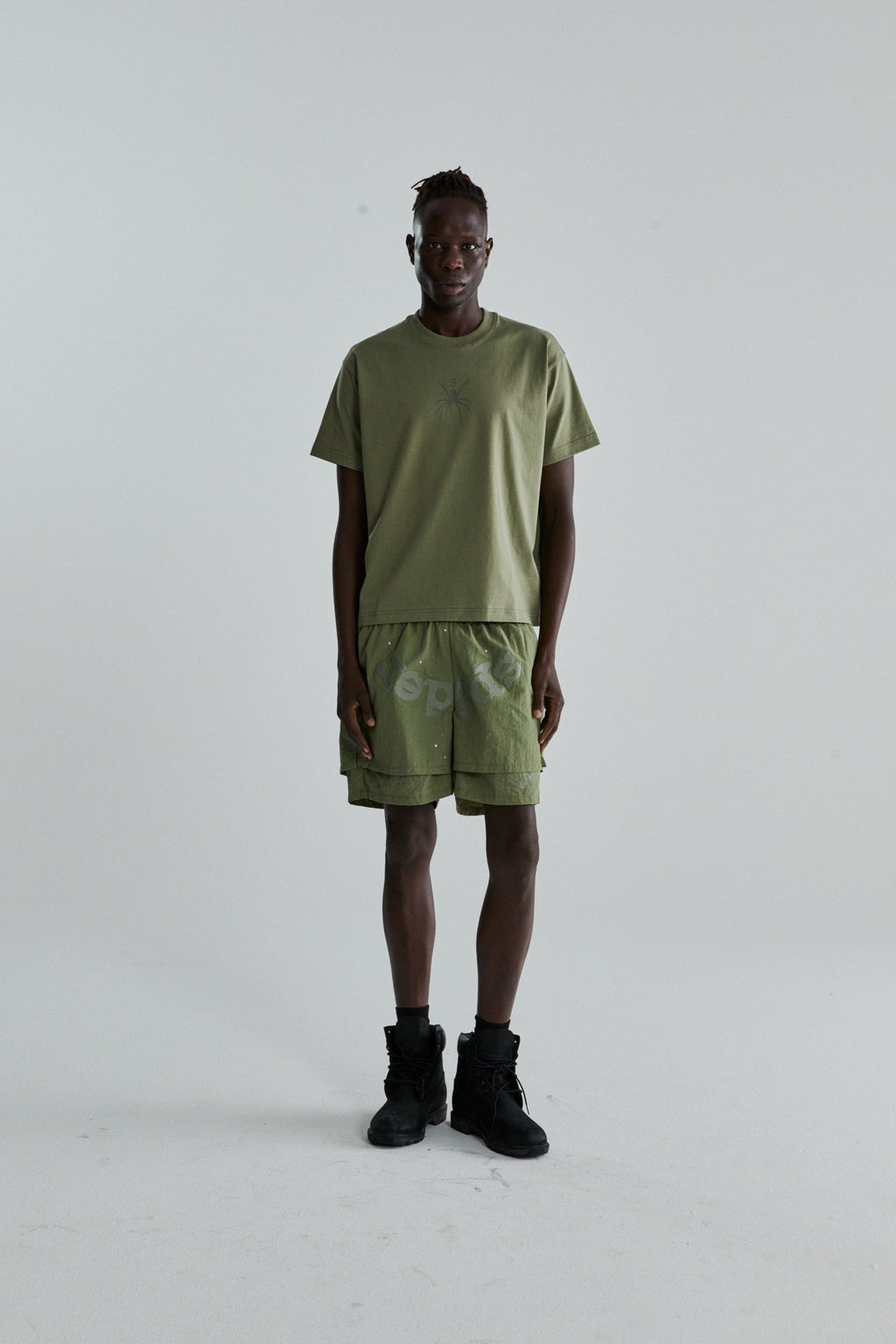 SAGE GREEN TM TEE ON MODEL