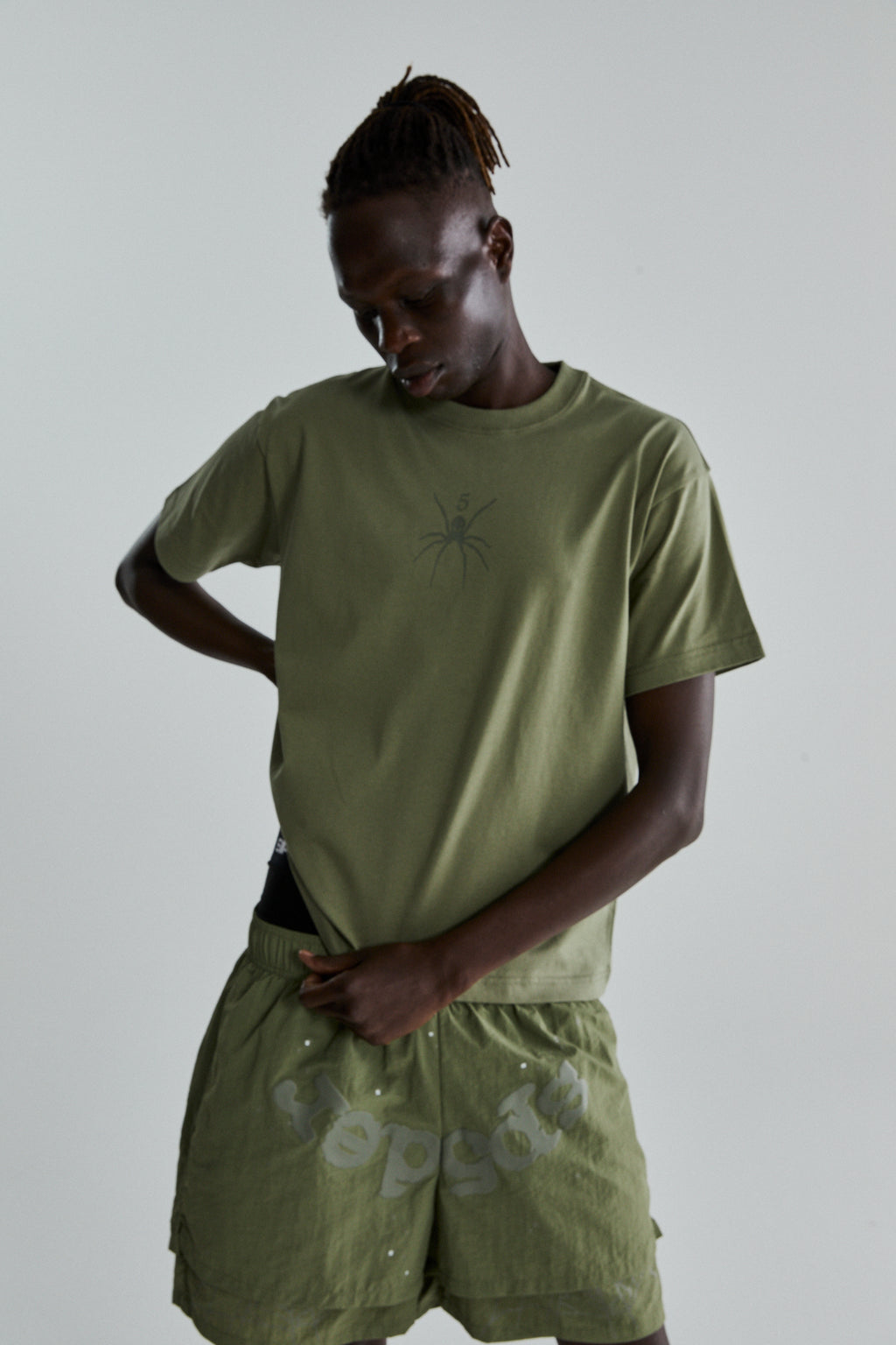 SAGE GREEN TM TEE ON MODEL