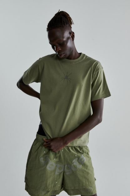 SAGE GREEN TM TEE ON MODEL