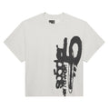 SP5 5LUMINUM TEE: White 100% cotton tee with a large black spray-paint style graphic on the front.