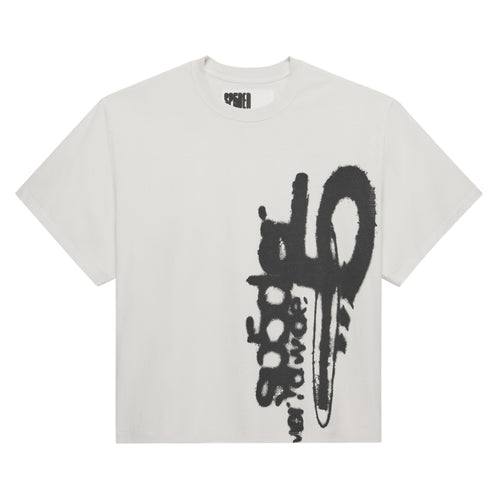 SP5 5LUMINUM TEE: White 100% cotton tee with a large black spray-paint style graphic on the front.