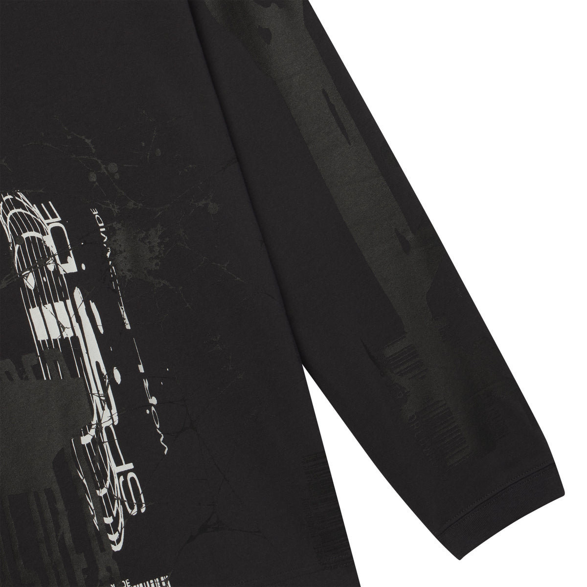 Black 100% cotton long sleeve tee featuring a white and grey fragmented graphic print on the front and sleeves.