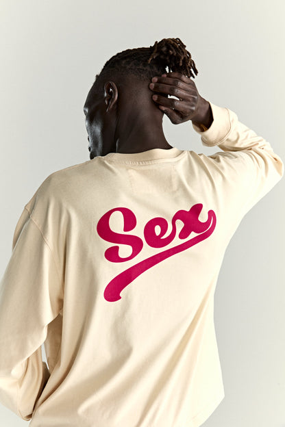 CREAM PORNSTAR LONGSLEEVE TEE ON MODEL