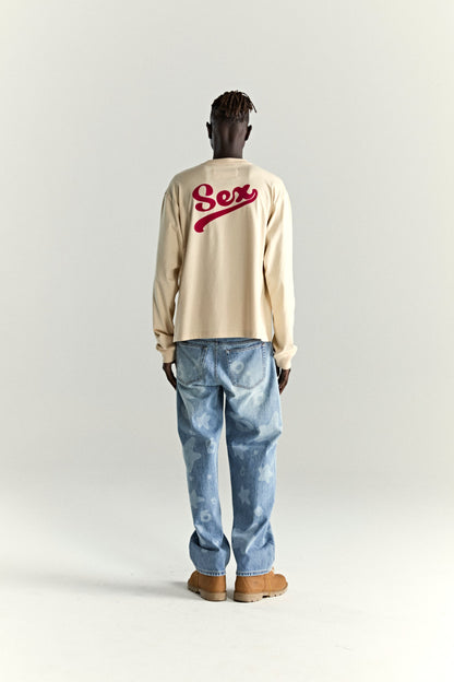 CREAM PORNSTAR LONGSLEEVE TEE ON MODEL