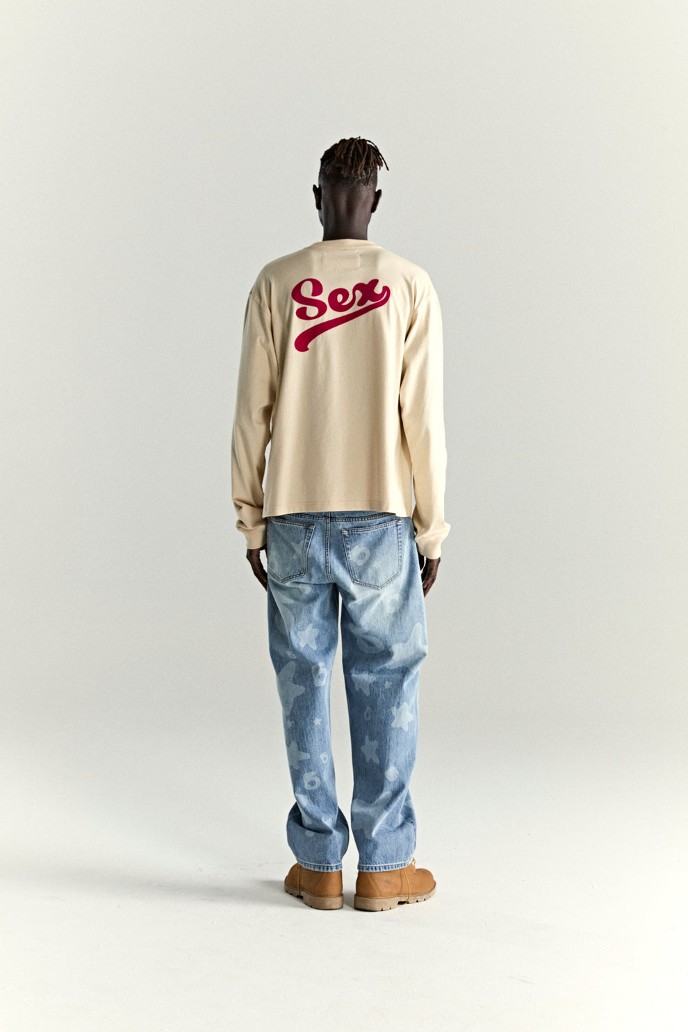 CREAM PORNSTAR LONGSLEEVE TEE ON MODEL