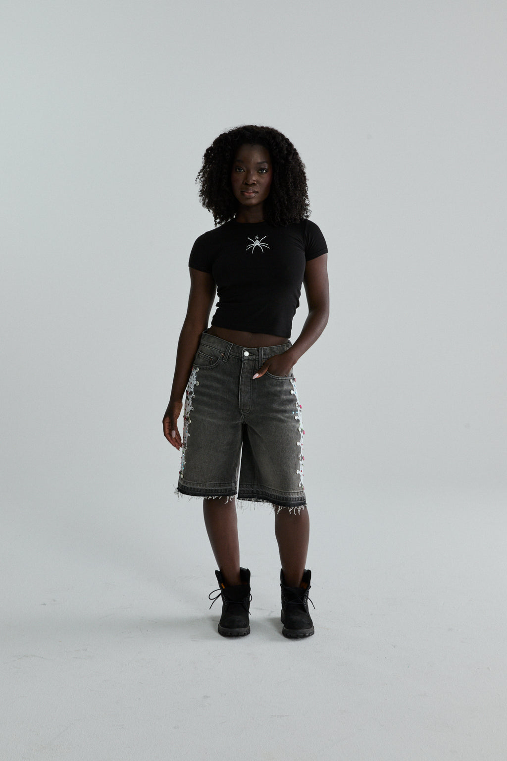 BLACK TM BABY TEE ON MODEL