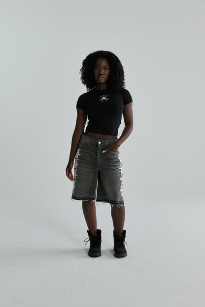 BLACK TM BABY TEE ON MODEL