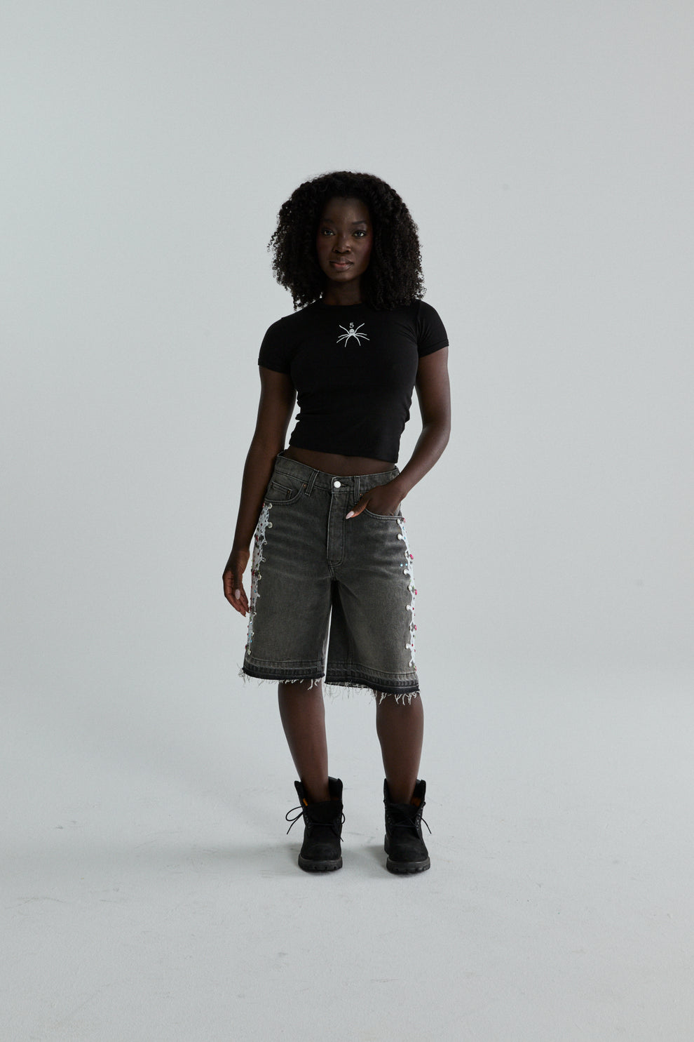 BLACK TM BABY TEE ON MODEL