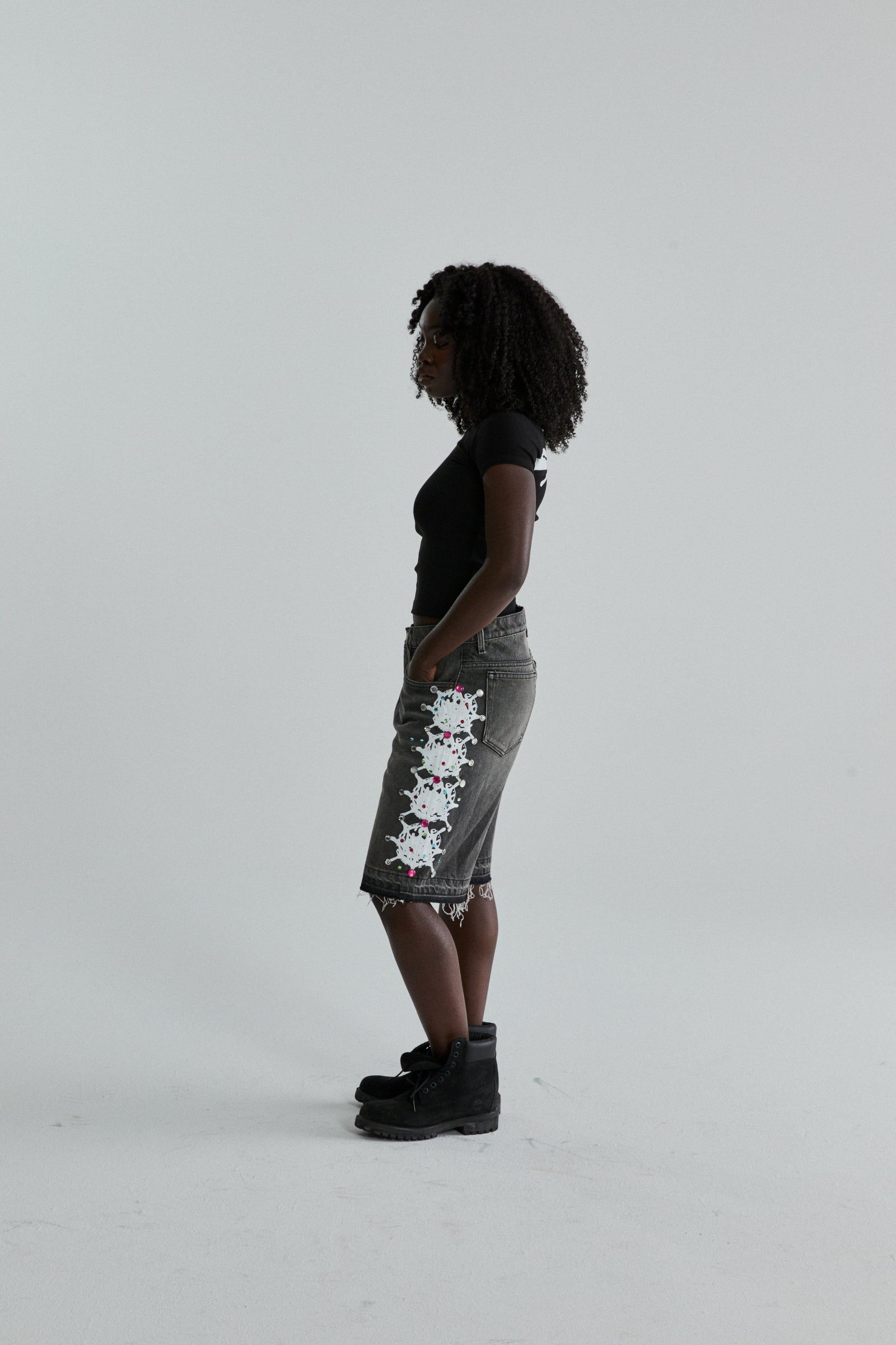 BLACK TM BABY TEE ON MODEL