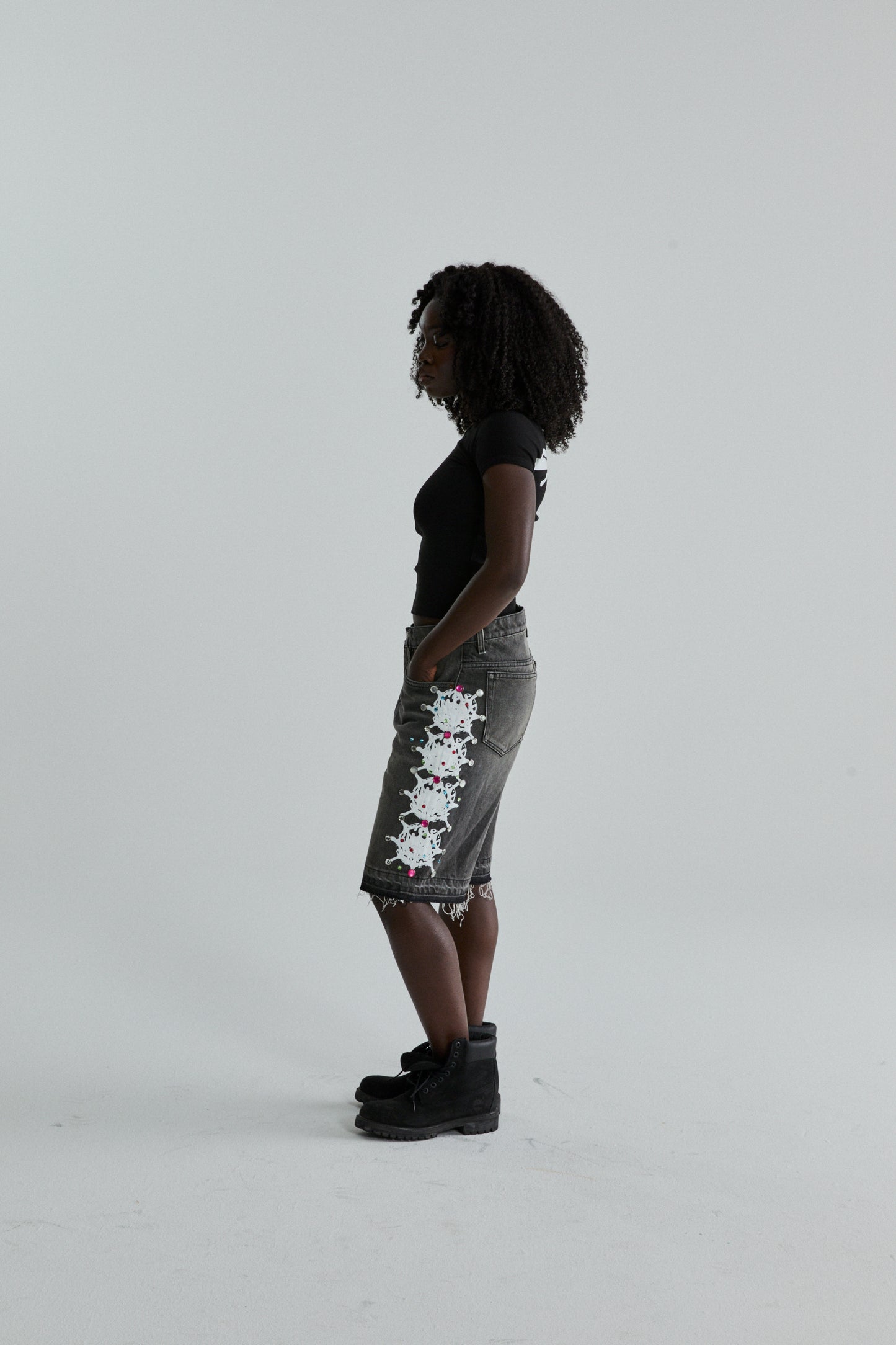 BLACK TM BABY TEE ON MODEL