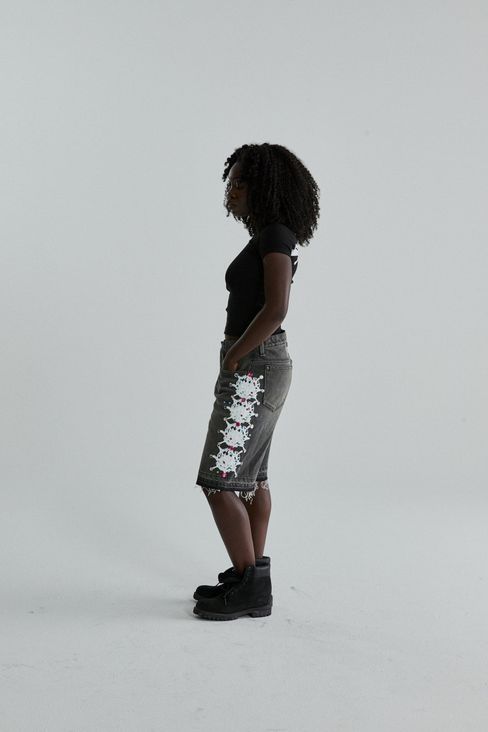 BLACK TM BABY TEE ON MODEL