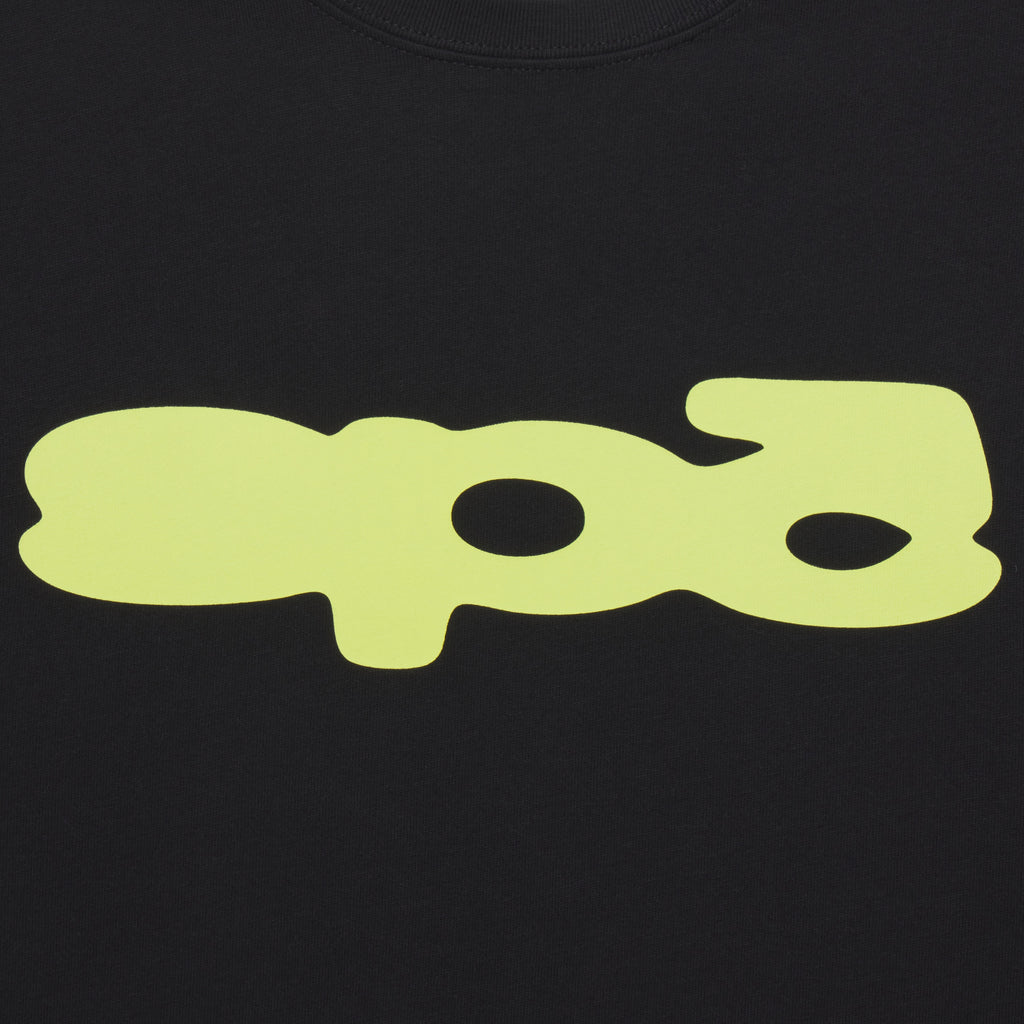 Black 100% cotton t-shirt featuring a lime green bubble-style graphic print on the front.