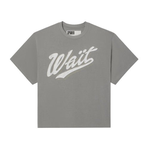 Grey 100% cotton t-shirt with a white cursive Wait graphic print and sparkling rhinestone detailing on the front.