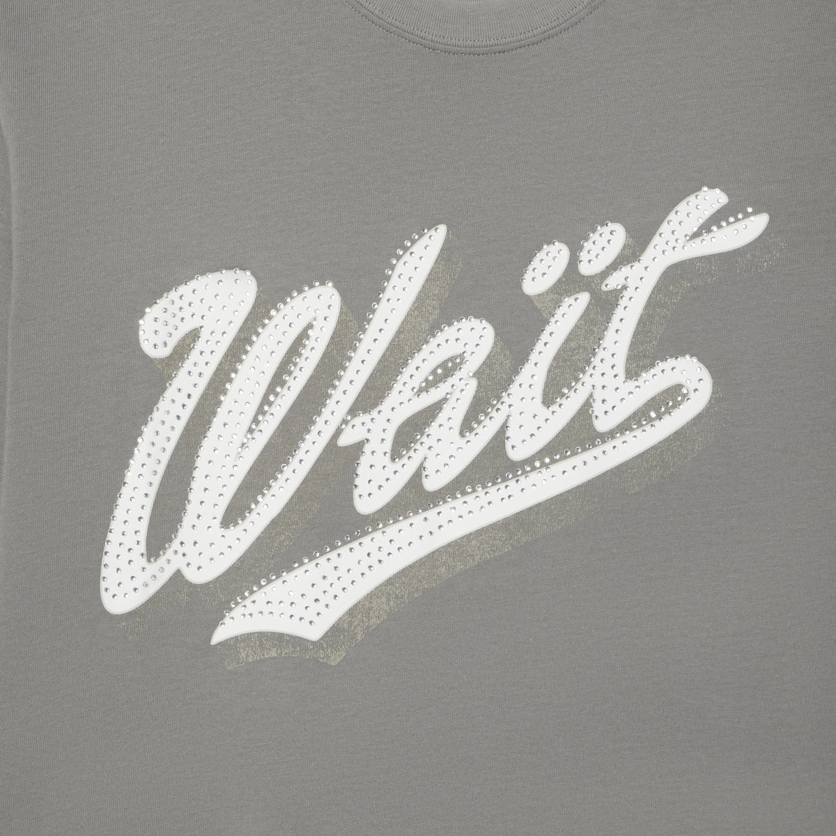 Grey 100% cotton t-shirt featuring a white graphic print of the word Wait embellished with sparkling rhinestone details.