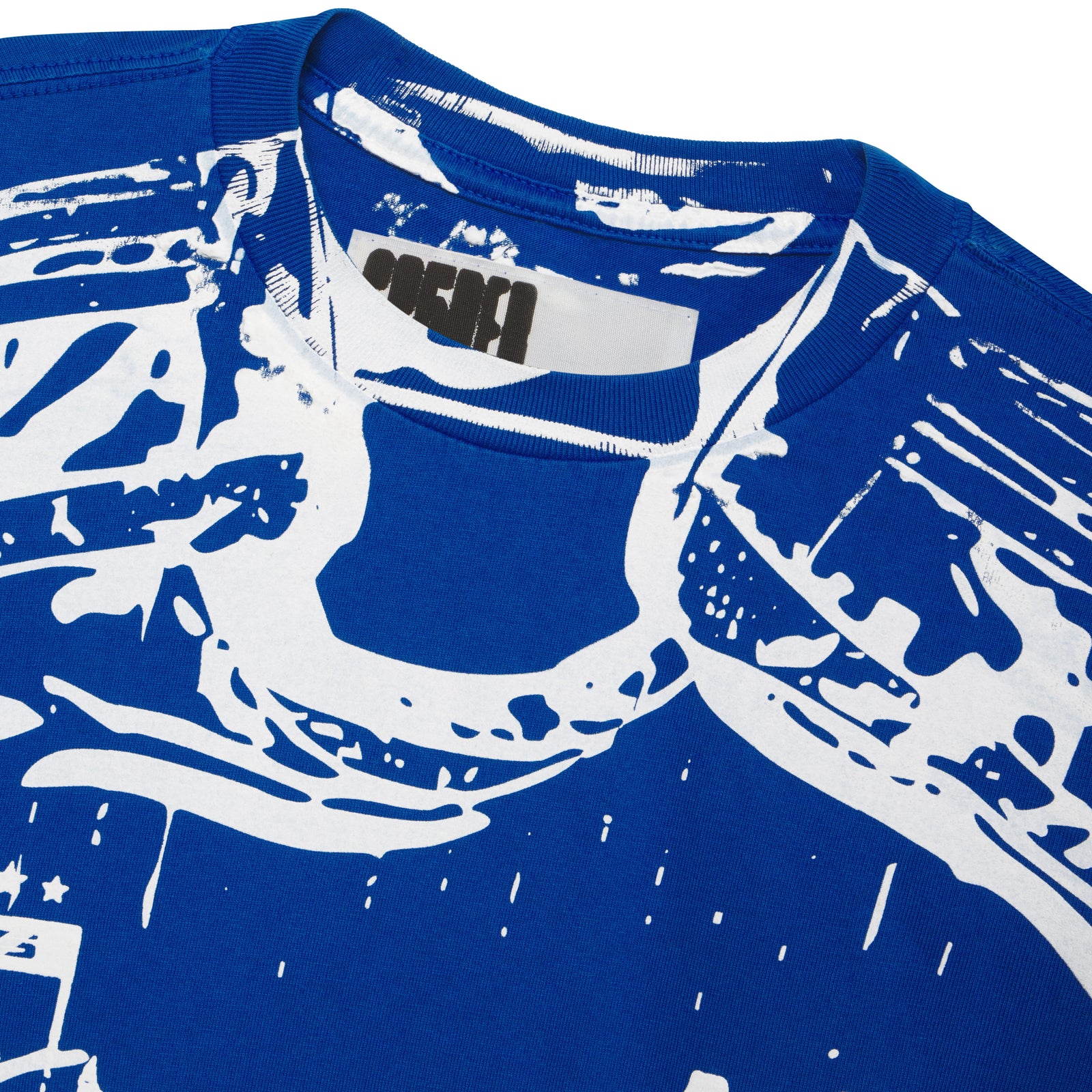 Blue 100% cotton JERSEY OVERPRINT TEE with white trompe l'œil graphic print on front.