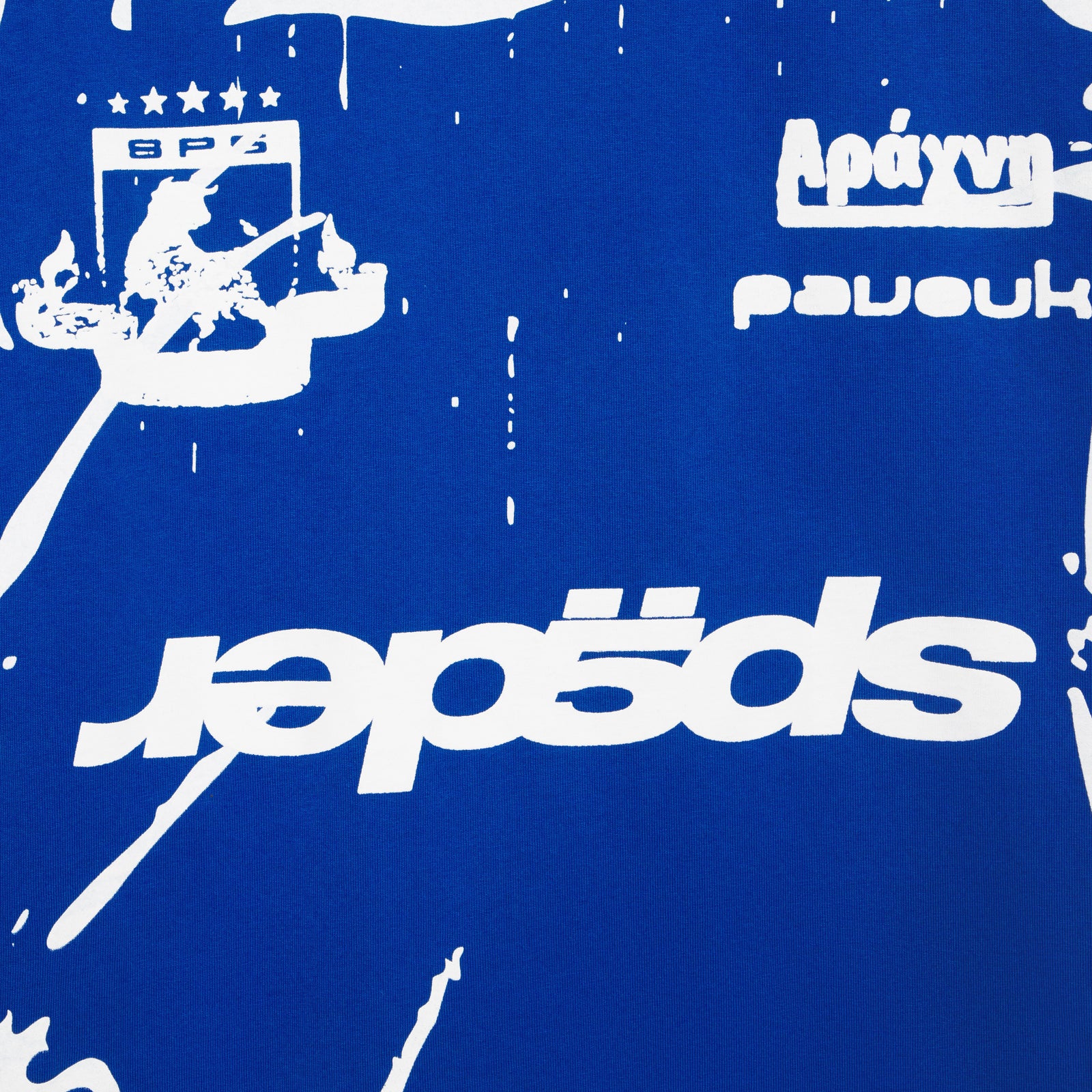 Blue 100% cotton tee with white graphic print, including text and a crest design.
