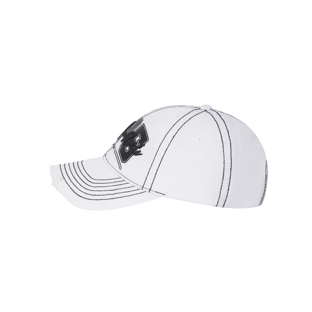 White denim baseball cap with black contrast stitching, layered logo appliqué, and a distressed curved brim.