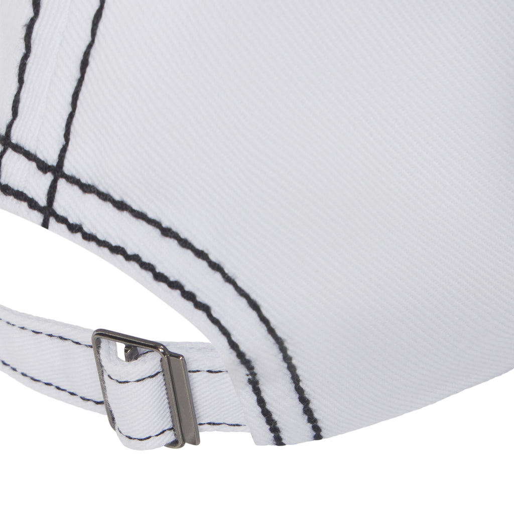 White denim baseball cap with black contrast stitching and an adjustable metal buckle strap.