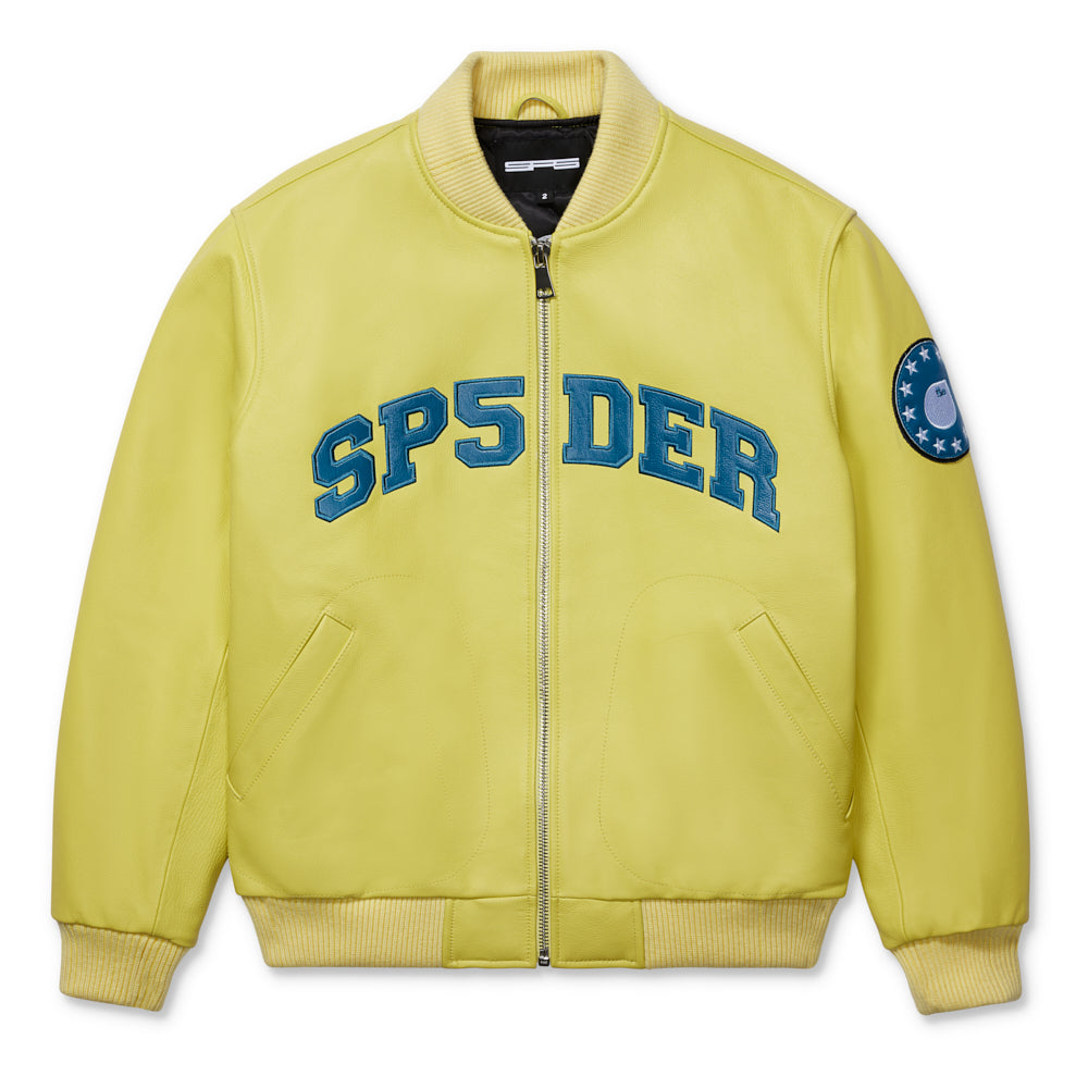 Yellow cowskin leather bomber jacket with blue "SPS DER" chest patches and a circular arm patch.
